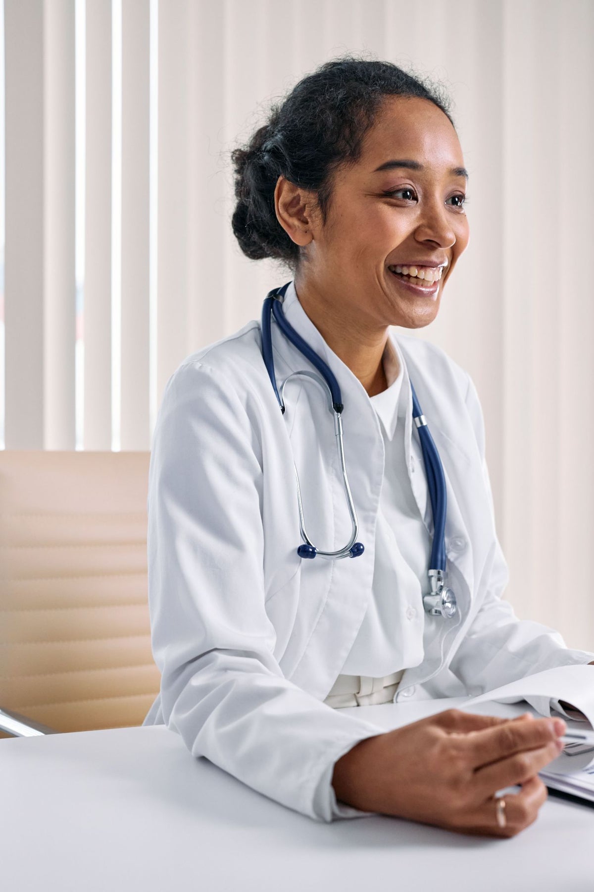 Smiling wellness doctor during a consultation